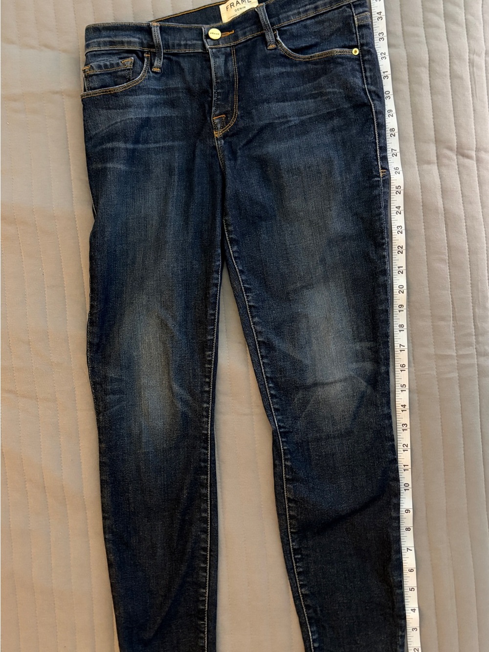 Frame Denim Indigo Skinny Jeans with Subtle Fade